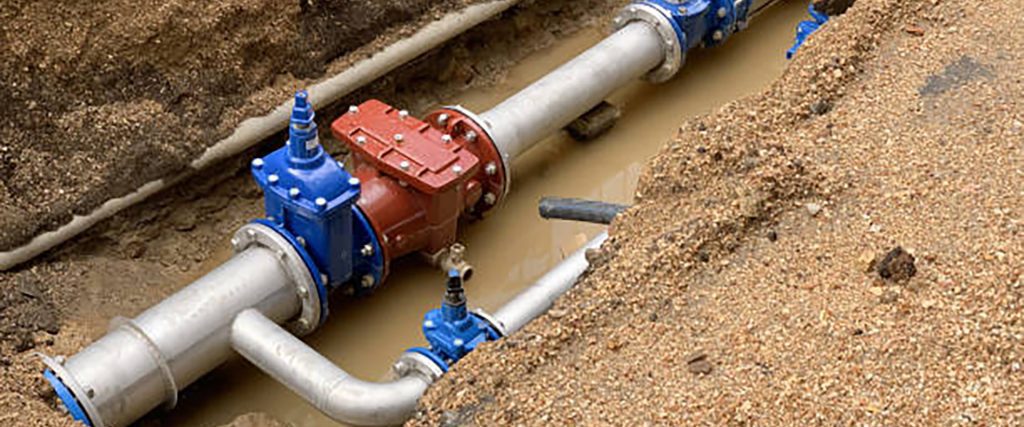 image of new water pipe in the ground